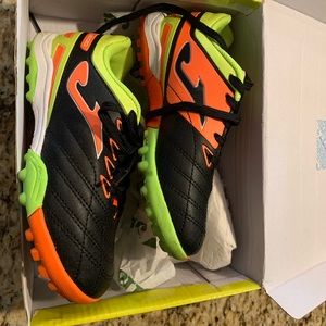 Joma Brand little boys soccer shoes. Never worn.